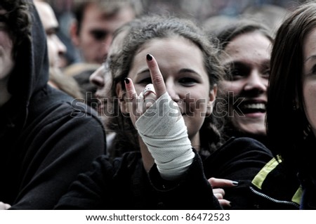 CLUJ NAPOCA – OCTOBER 8: Unidentified  fans at a sold out Scorpions live concert at Cluj Arena Grand Opening, on October 8, 2011 in Cluj Napoca, Romania