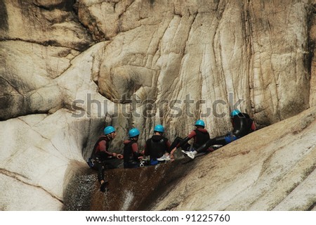 PURCARACCIA CANYON, CORSICA - AUGUST 28: An extreme sports team participates in a canyoning contest on the famous waterfalls of Purcaraccia valley, on August 28, 2010 in Corsica, France