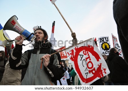 CLUJ NAPOCA. ROMANIA – FEBRUARY 11: Hundreds of people protest against ACTA, against web piracy treaty, and the government in Cluj Napoca, on February 11, 2012 in Cluj Napoca, Romania
