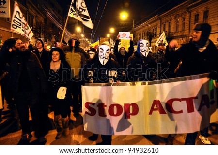 CLUJ NAPOCA, ROMANIA – FEBRUARY 11: Hundreds of people protest against ACTA, against web piracy treaty, and the government in Cluj Napoca, on February 11, 2012 in Cluj Napoca, Romania