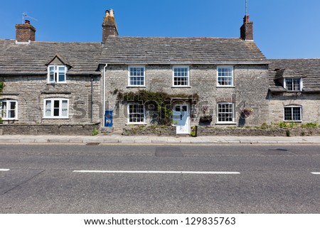 Traditional row of stone English homes.