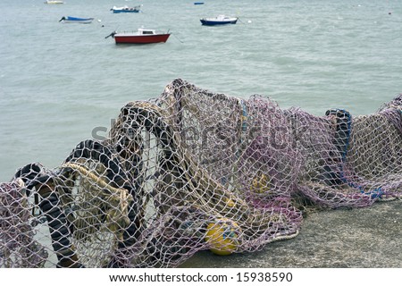 Commercial fishing nets and boats in the Oyster capital of France.