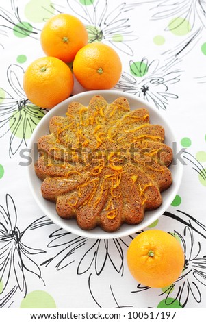 homemade orange cake with poppy seeds - sweet food /shallow DOFF/