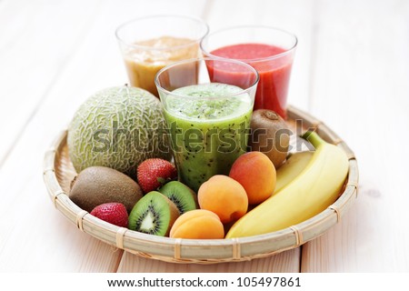 various fruity shakes with fresh fruits - food and drink