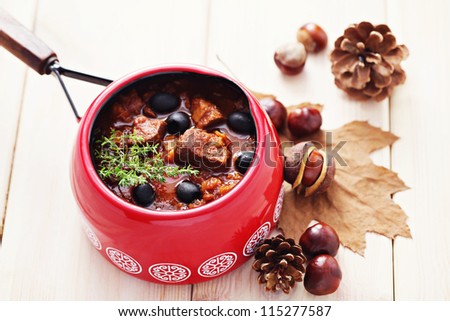 delicious goulash with black olives - food and drink /shallow DOFF/