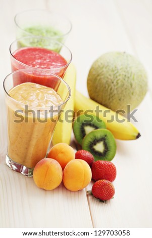 various fruity shakes with fresh fruits - food and drink