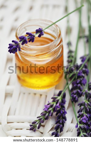 herbal honey in jar with fresh flower - sweet food /shallow DOF/