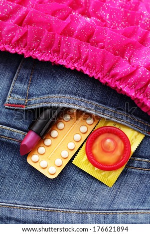 birth control pill with condom - healthcare and medicine