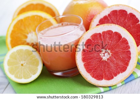 glass of fresh citrus fruit juice - food and drink
