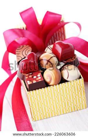 box of chocolates with red ribbon - sweet food
