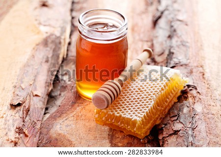 jar of honey with honey comb - food and drink