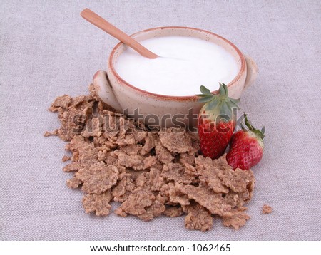 on diet - yogurt, corn-flakes and sweet strawberries (image contains noise)