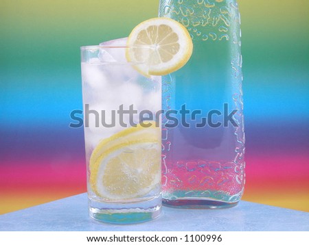 bottle of gin and iced drink on colorful background