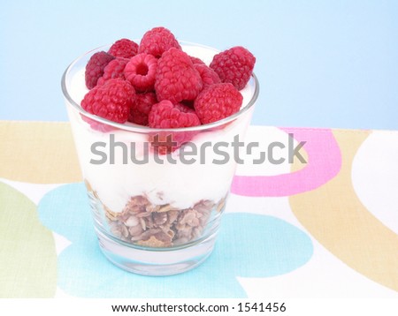delicious low-calorie breakfast - berries yogurt and musli