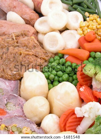 plate full of cooked vegetables and meat