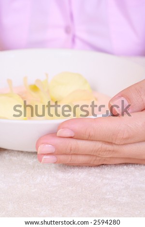 bowl of balsam and rose petals - hands care