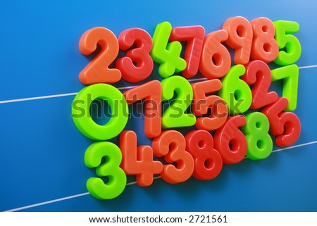 close-ups of colorful number on blue board - education