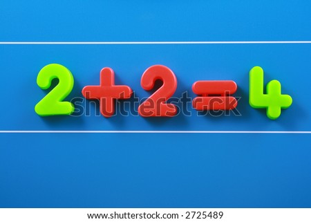 close-ups of colorful number on blue board - education