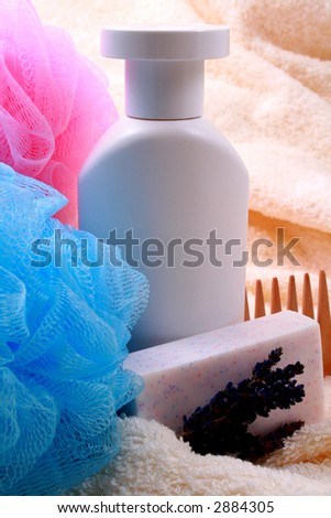 close-ups of shampoo sponge and lavender soap - beauty treatment