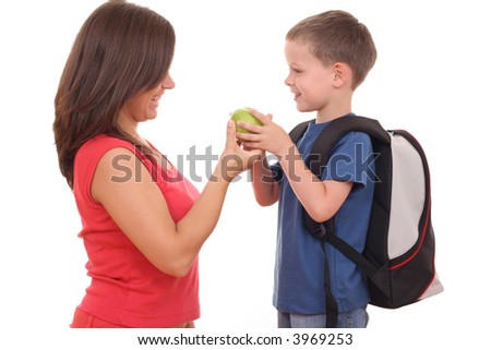 five years old boy and his mother with backpack and apple isolated on white
