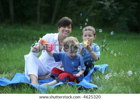 family and bubbles - relaxing outside