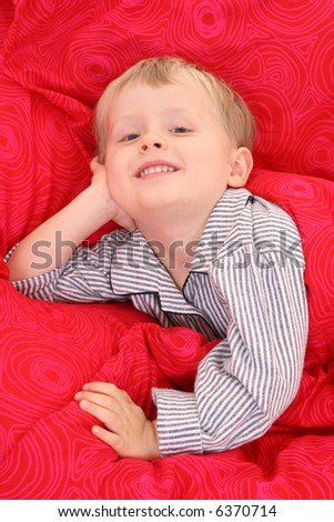 cute 3-4 years old boy in bed - ready to sleep