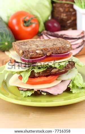 big sandwich and everything you need to have delicious breakfast