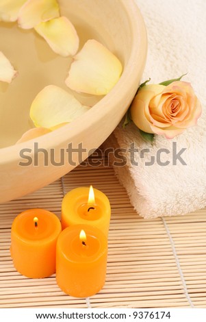 bowl of pure water rose and candles