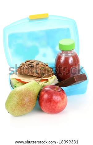 box with lunch - delicious sandwich fruit and juice on white