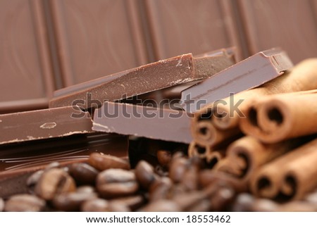 arrangement of chocolate coffee and cinnamon sticks