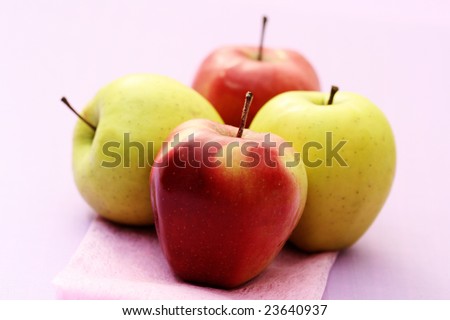 red and green apples on pink - food and drink