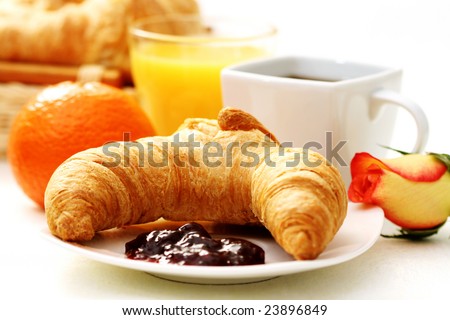 butter croissant and coffee for breakfast - food and drink