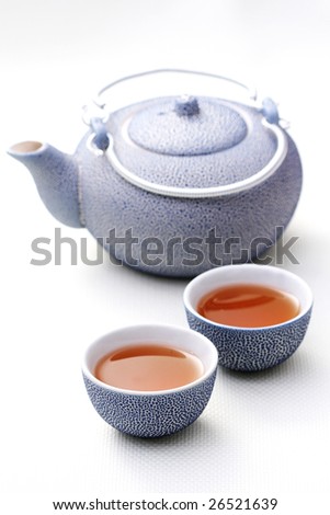 two cups of tea with pink flowers - food and drink