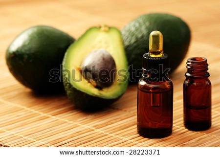 bottle of avocado essential oil - beauty treatment
