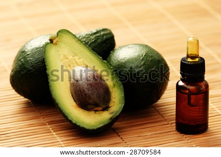 bottle of avocado essential oil - beauty treatment