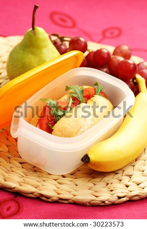 lunch box with delicious bun - food and drink