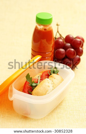 lunch box with delicious bun - food and drink