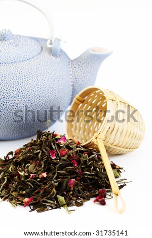 pile of white tea with rose petals on white - tea time