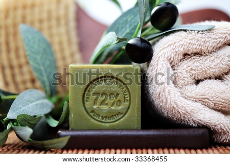 bar of olive oil soap and some spa products