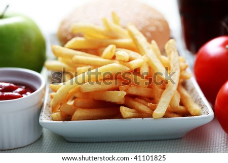 lunch time cheeseburger and french fries - food and drink