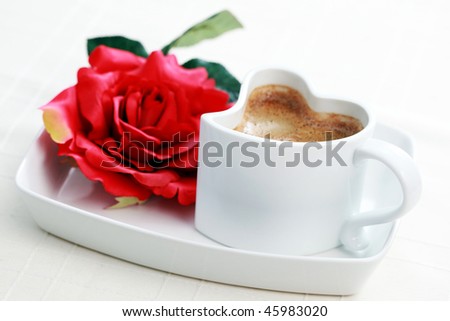 cup of coffee shape of heart and red rose - coffee time