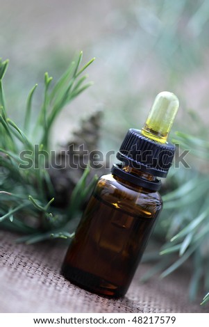 bottle of fir tree essential oil - beauty treatment