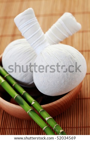 massage stamps with pebbles and lucky bamboo - beauty treatment
