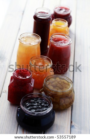 different jars full of fruity jam - food and drink