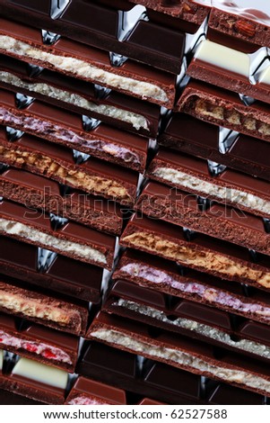 stack of delicious and various chocolates  - sweet food