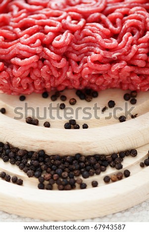 fresh beef meat with black pepper - food and drink