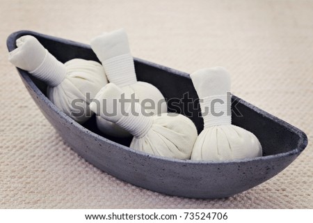 bowl of massage stamps - beauty treatment