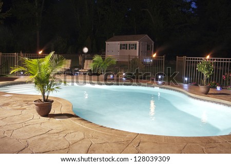 Luxury Salt Water Pool And Patio At Night.