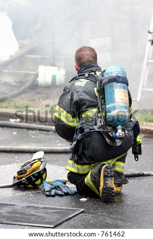 Baltimore City Firefighter takes a breather.