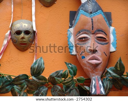 Tribal face masks on wall